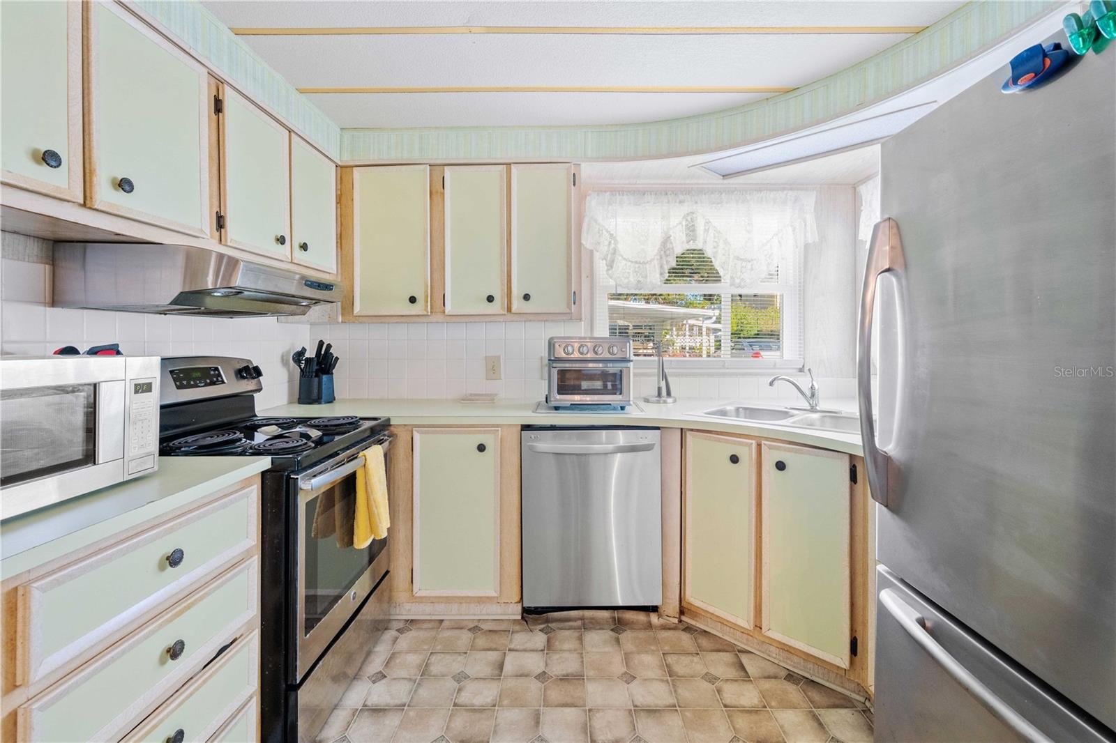 Kitchen offers stainless steel appliances.