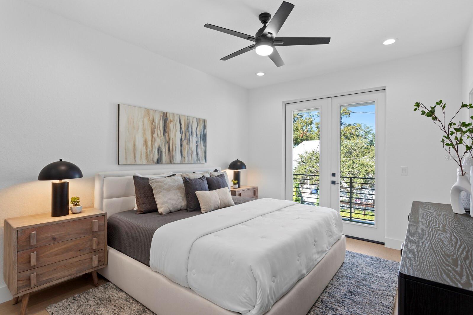 Primary bedroom with private balcony