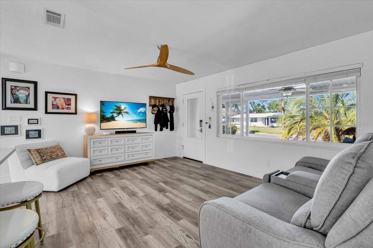 Luxury Vinyl Floors over Terrazzo, wood ceiling fan