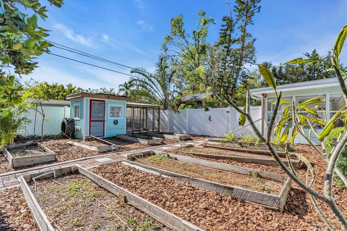 Create your own flower or veggie garden with the 8 planter beds with drip irrigation.  Chicken coup has been turned into a shed but you could easily be turned back in to its original purpose.