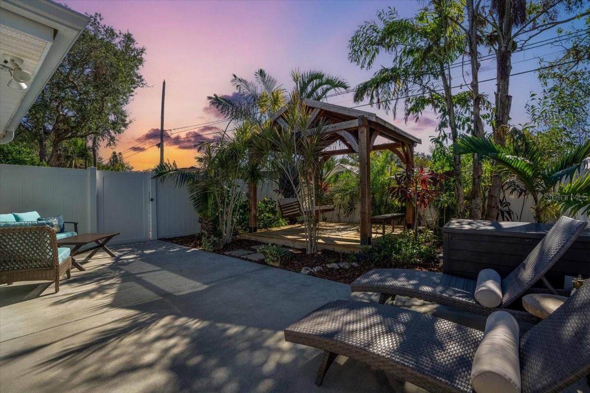 A private oasis, spa-like back yard with outdoor shower.  Shade and sun.