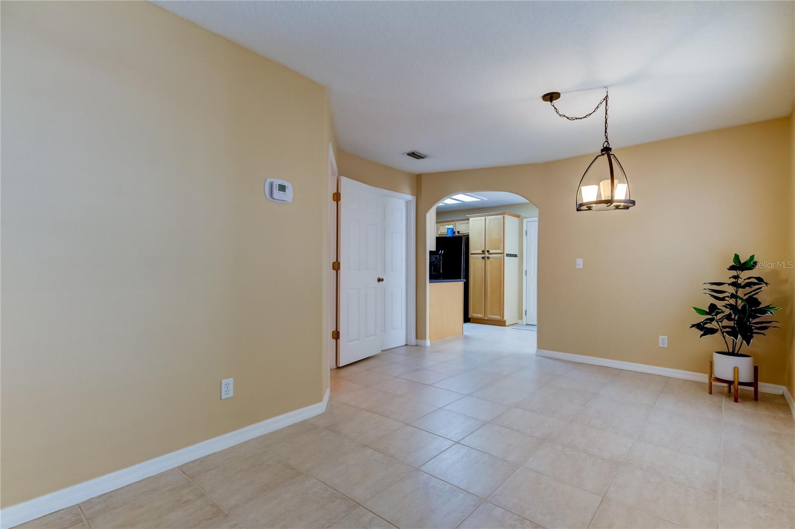 21. Dining Area (10' x 12') Offers Loads of Natural Light.. + Warm Light Overhead!