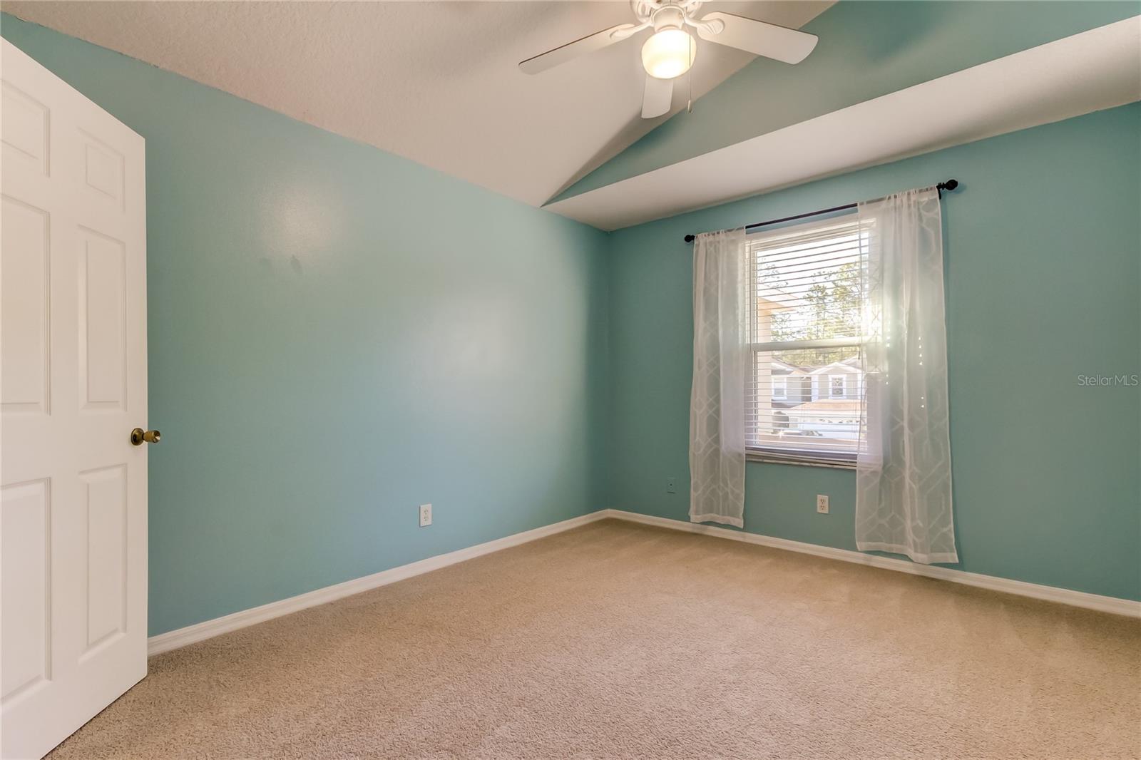 60. Bedroom #2 (12.10' x 10.11') Features a Walk in Closet! Ceiling Fan, New Window! Carpet's in GREAT Condition!