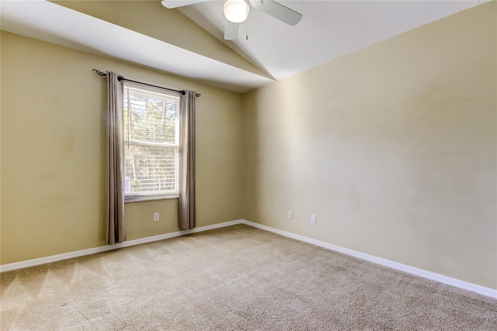 64. Bedroom #3 (12.10' x 10.11') Features a Spacious Closet! Ceiling Fan, New Window! Carpet's in GREAT Condition!