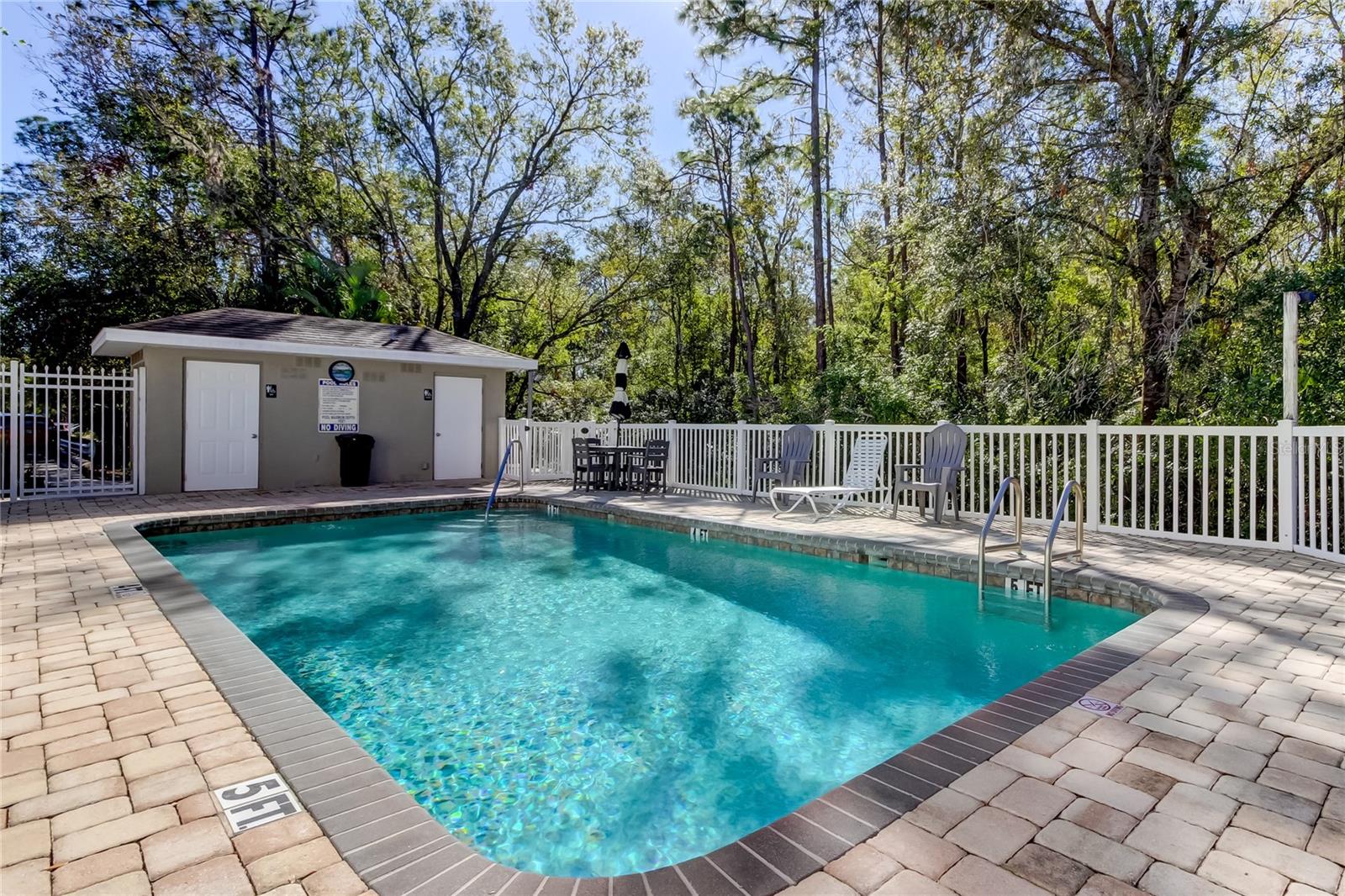 82. Community Pool is a Few Steps Away! Great Privacy too! Bathroom Bldg is Convenient for Pooltime!