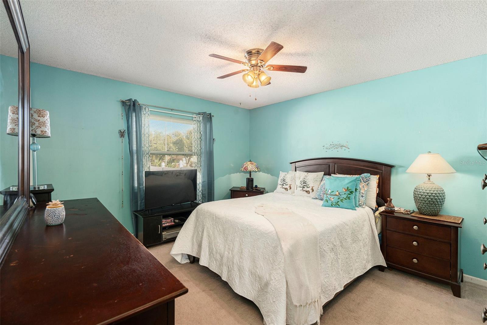 Primary bedroom with walk in closet