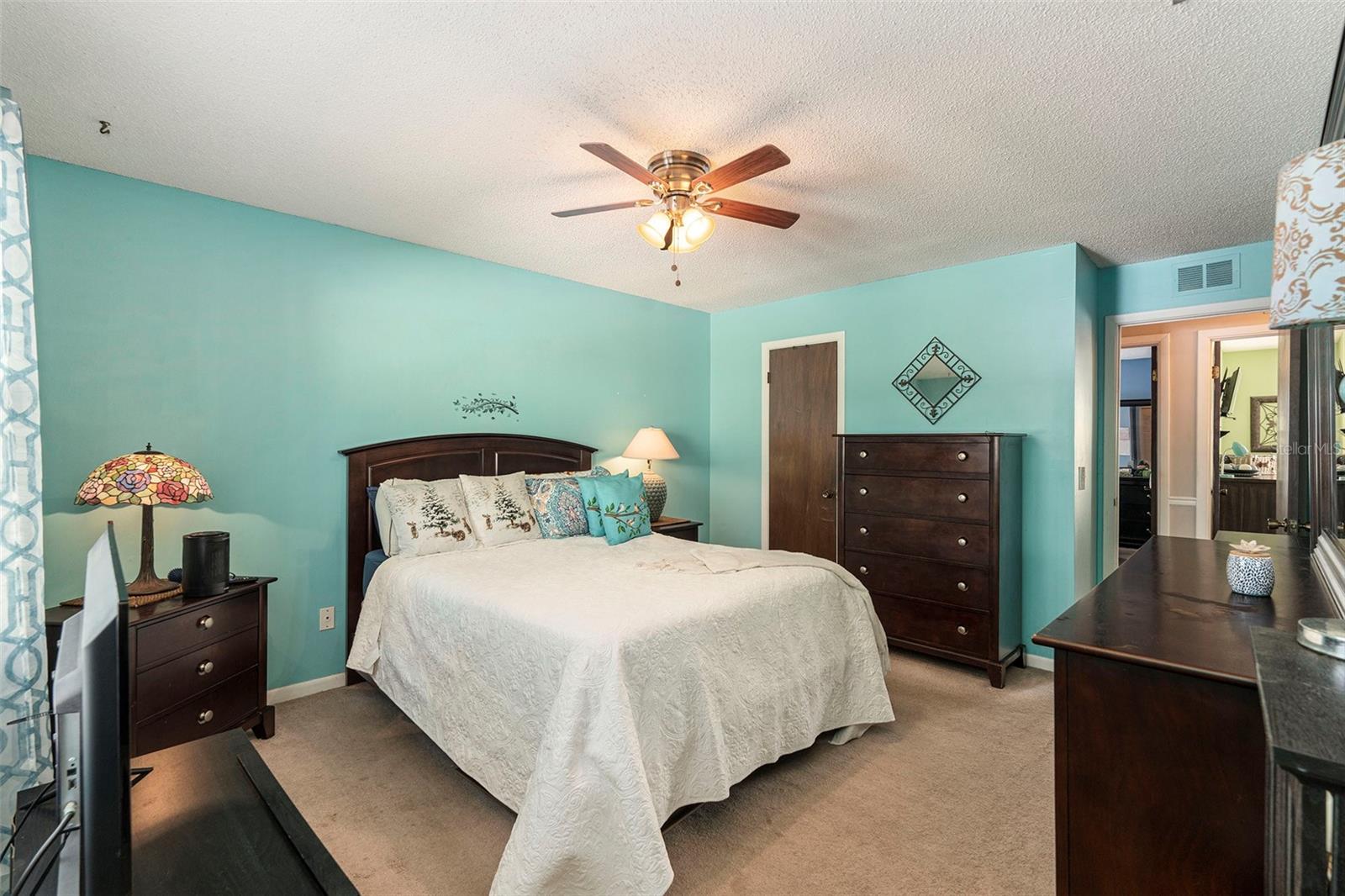 Primary bedroom with walk in closet