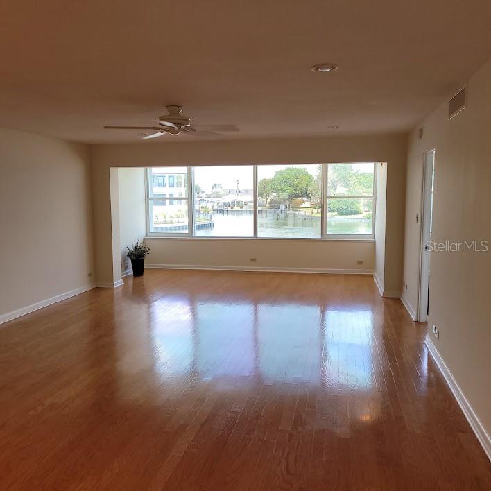 Welcome to unit 2B. Step into the 16X25 Living/Dining Room and begin to enjoy those views!! The seller's parents set up their dining area close to the windows to enjoy the amazing scenery! Birds, Dolphins, Fish, boats passing by, so much to enjoy!