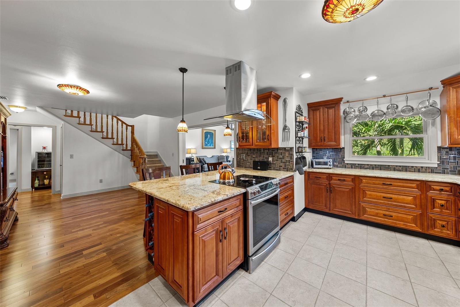 Solid Birchwood cabinets in the kitchen and stainless steel appliances