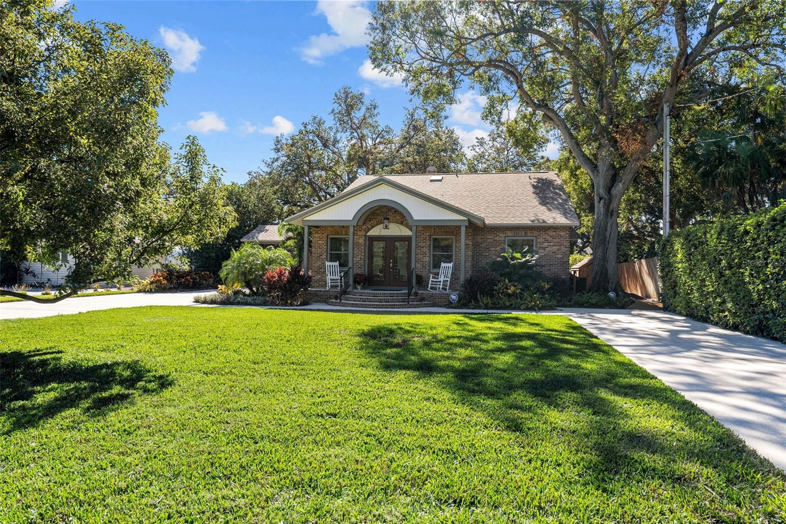 Spacious front yard with two extended driveways