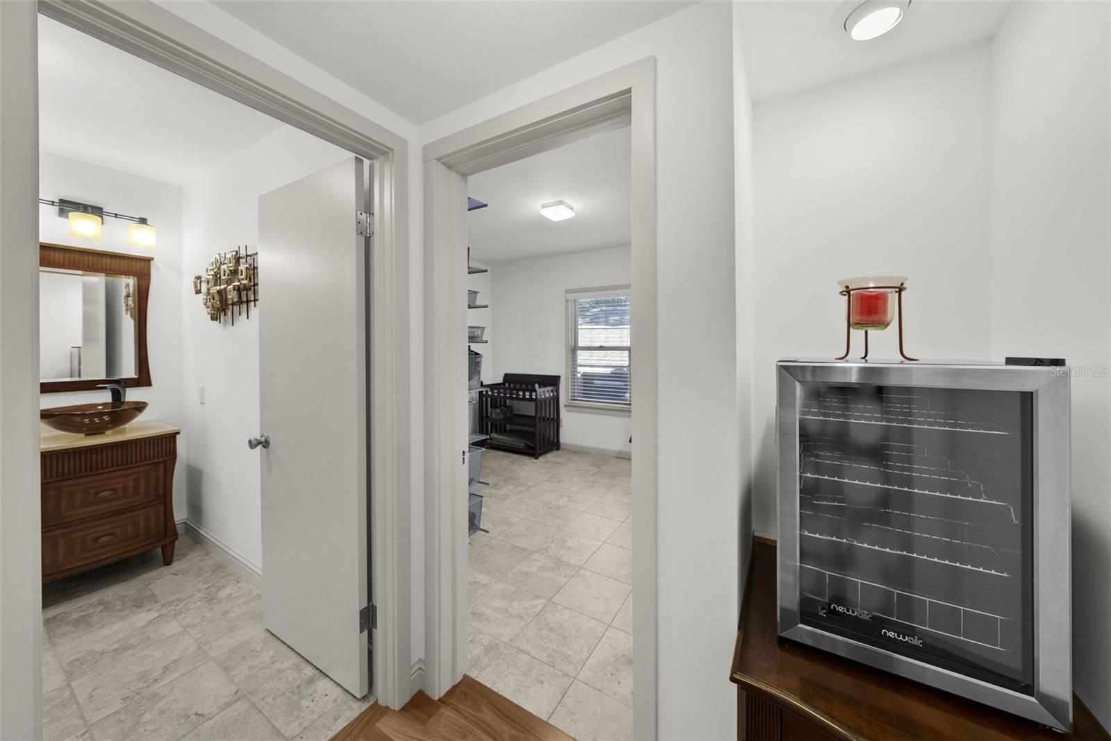 Laundry room and secondary bathroom on first floor