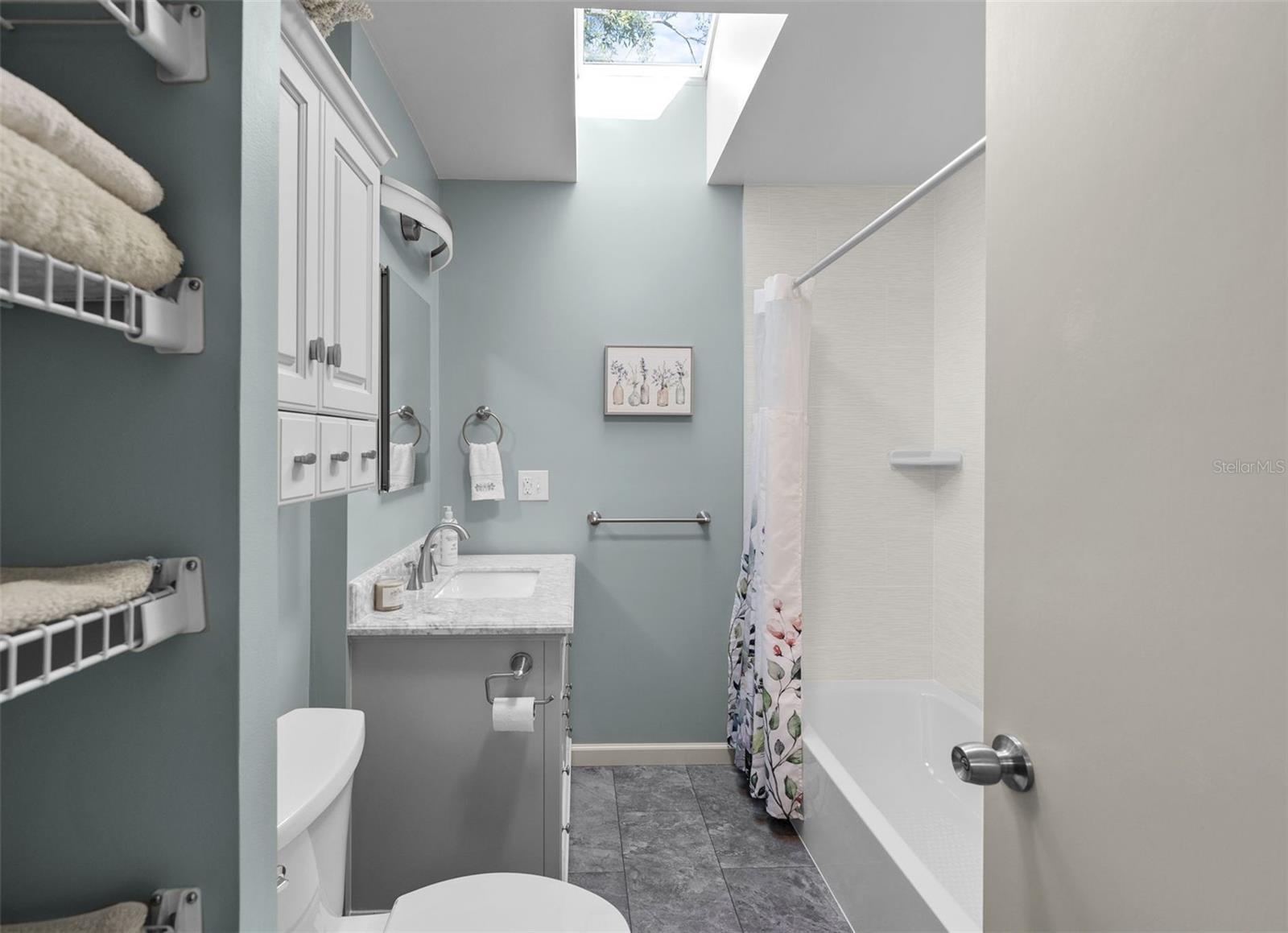 Fourth Bathroom upstairs with granite countertops