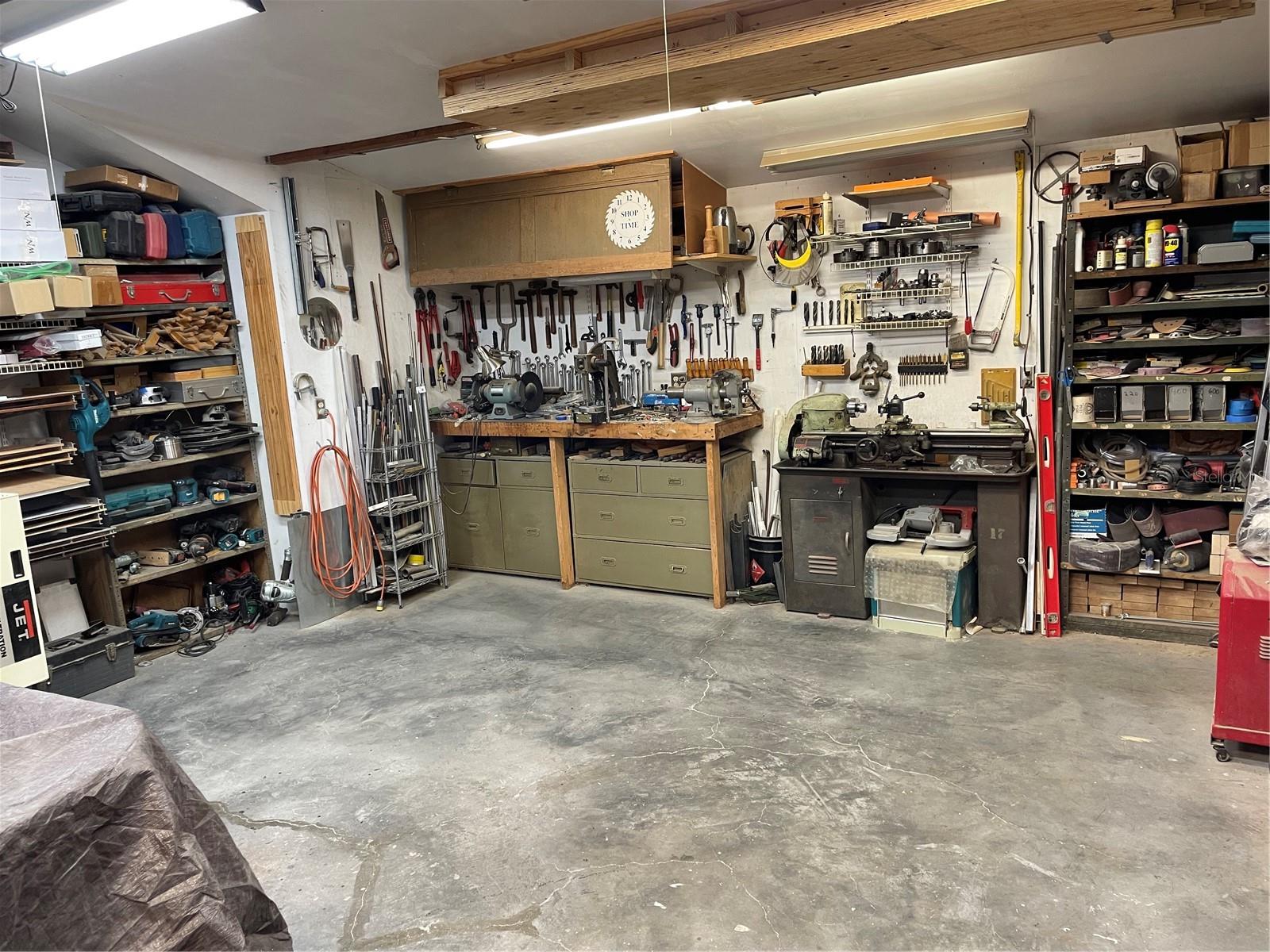 Workshop with tons of storage, AC and utility sink