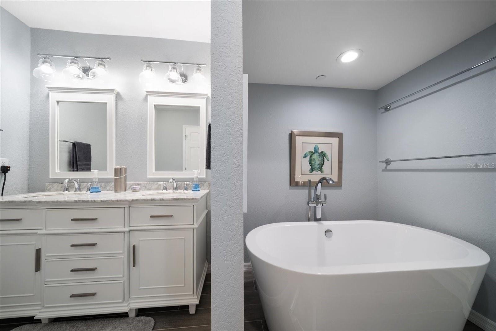 Primary bathroom is lovely! Relax in your soaking tub and let your worries melt away!