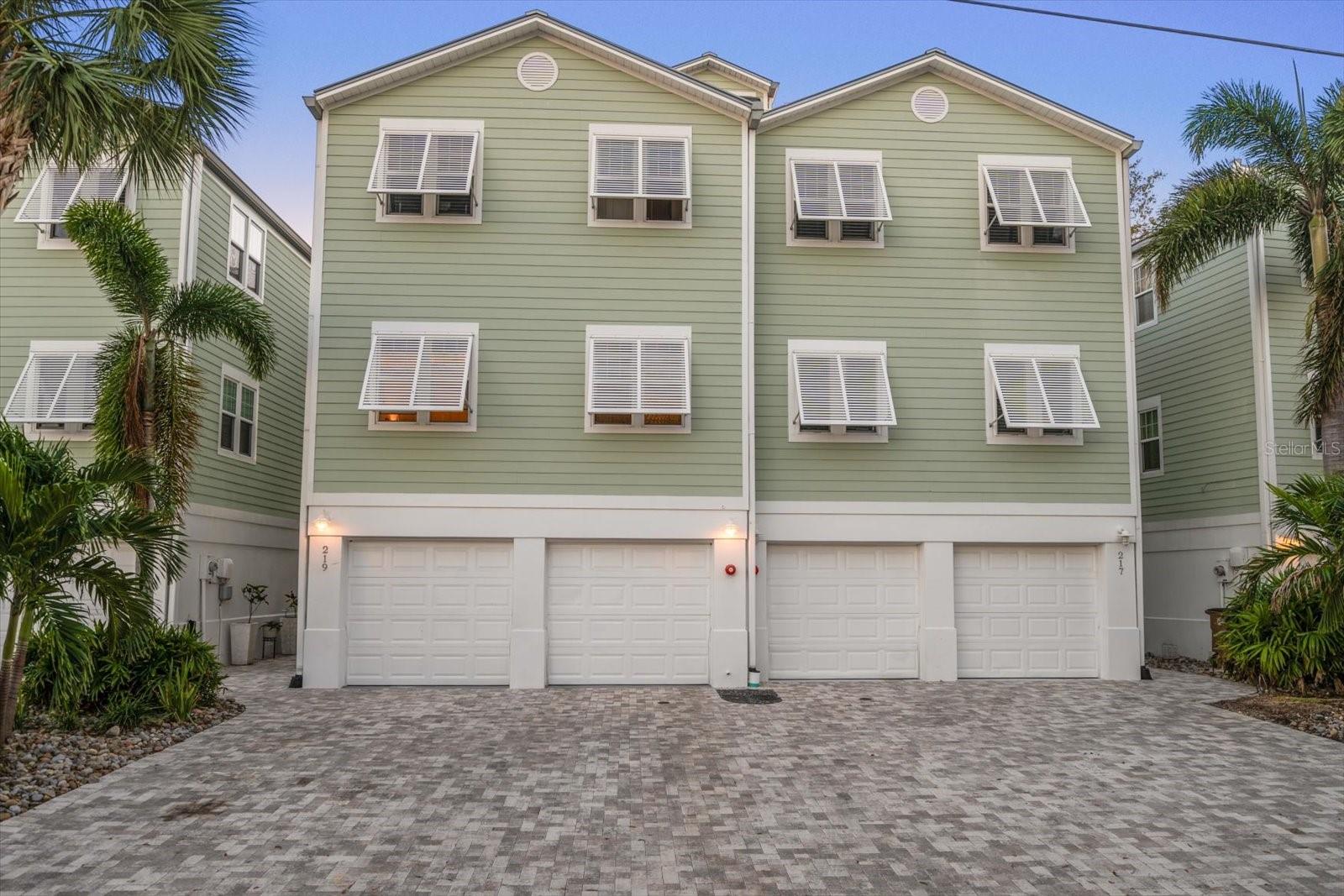 Appreciate all of the storage in the ground level 3 car garage. Elevator serving the upper living levels is also found in this area.