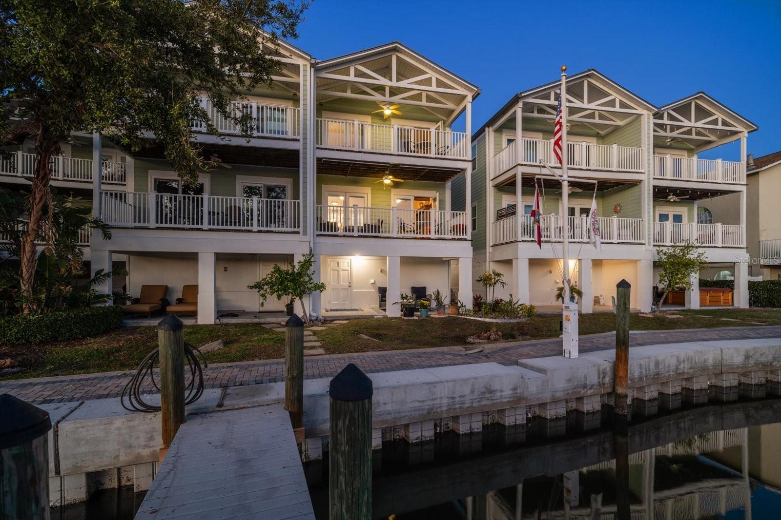 The townhome offers an oversized 3 car garage, ground level elevator which services the upper living levels and wide terraces for additional living area.