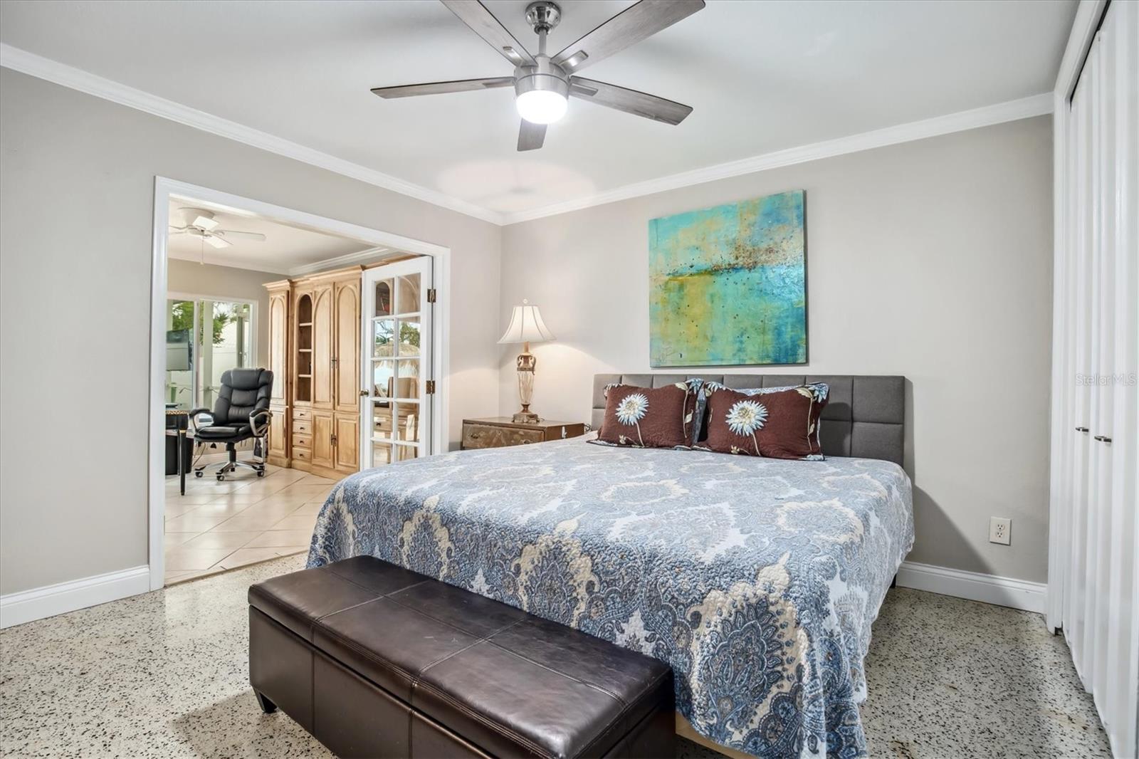 Primary suite with French doors to the bonus room