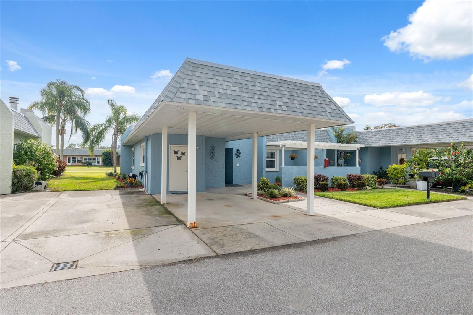 Carport and Small Courtyard in front of Home