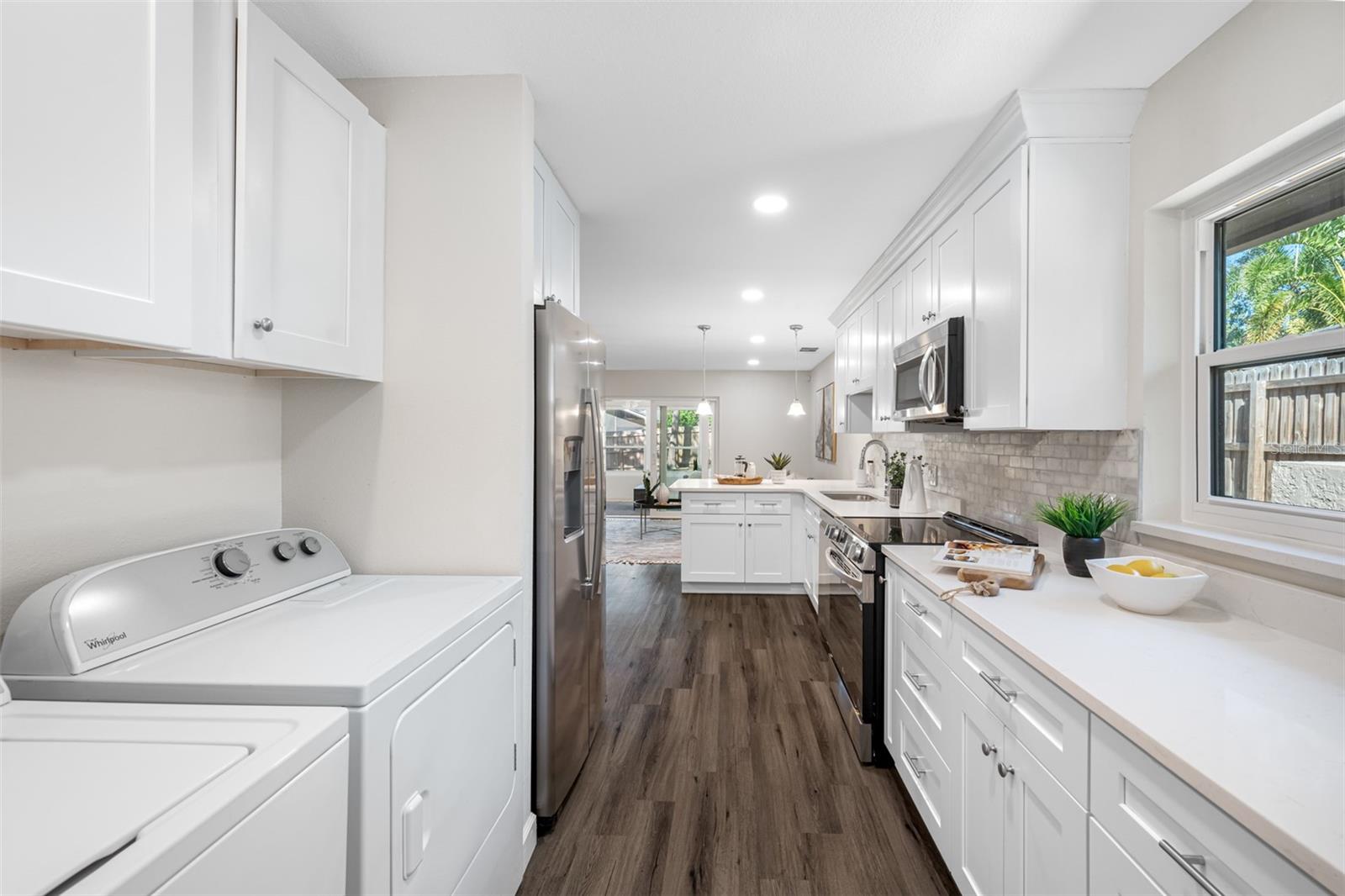 Washer and dryer in kitchen alcove