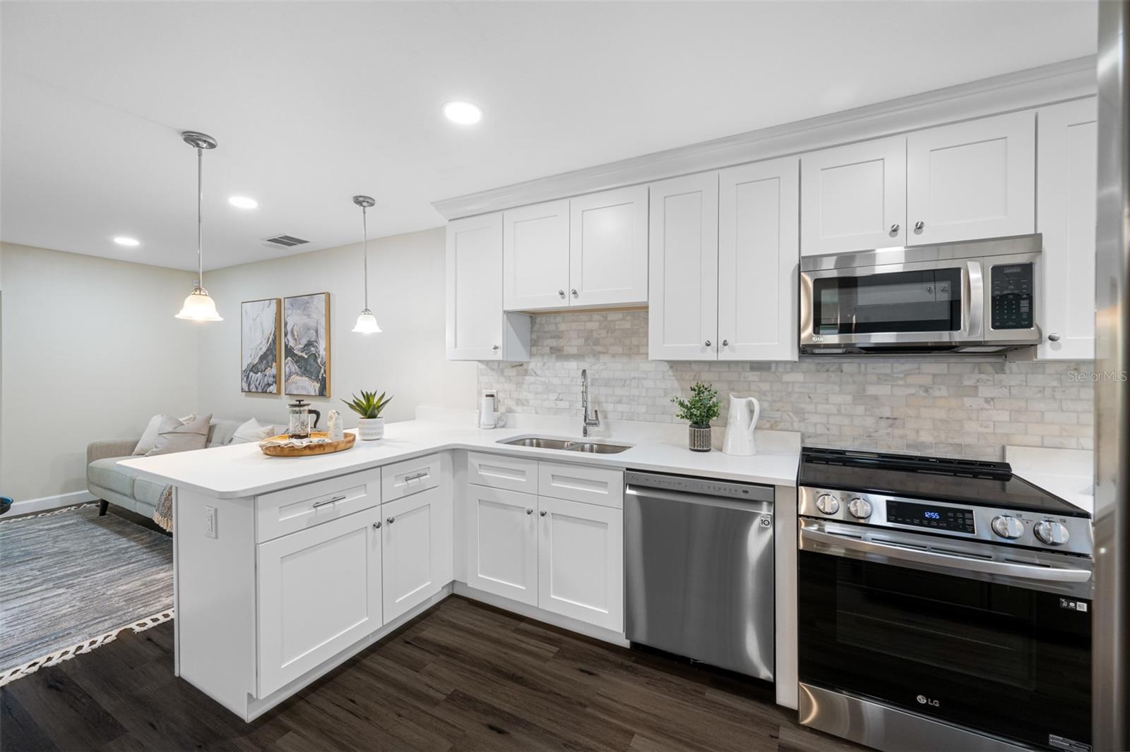 Kitchen is open to the family room and Florida room