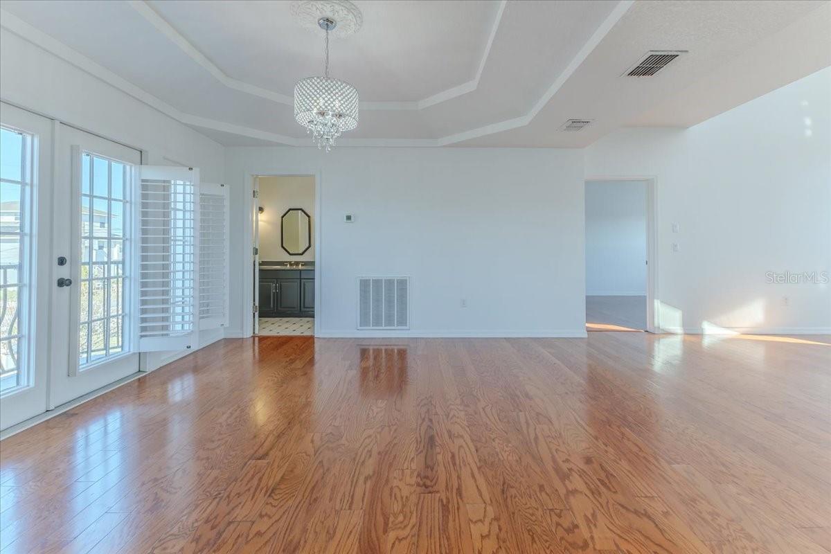 Dining Room with Double Trey Ceiling & Chandelier