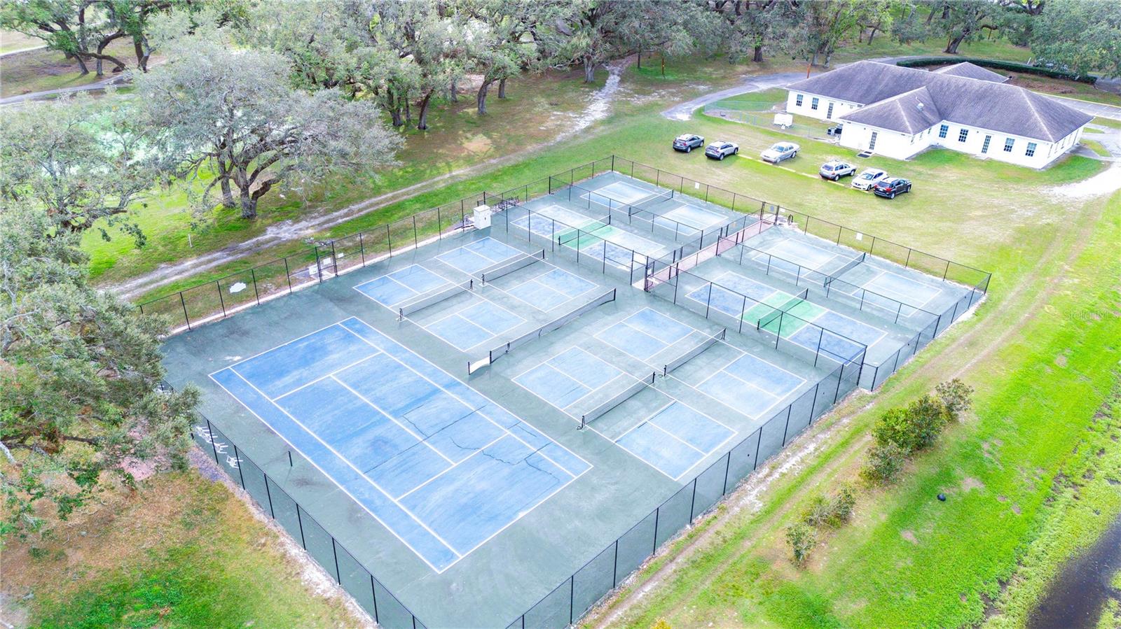 Community club house and tennis/pickleball courts.