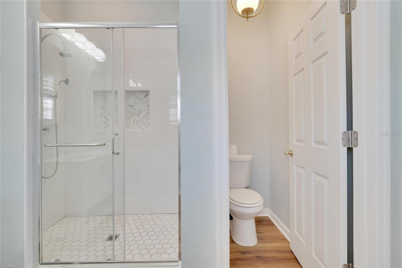 Primary bedroom with en-suite bath