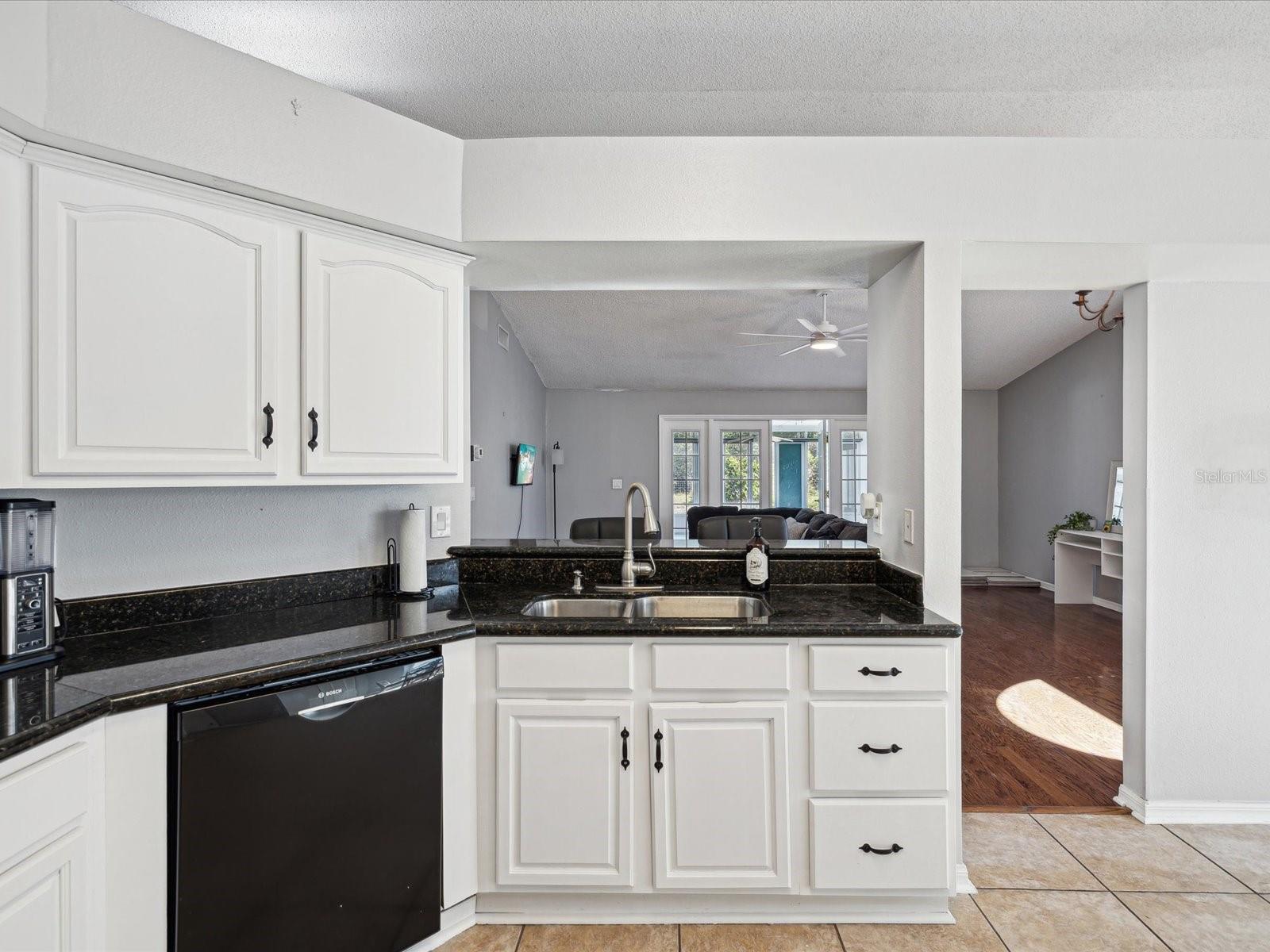 Kitchen looking out to family room