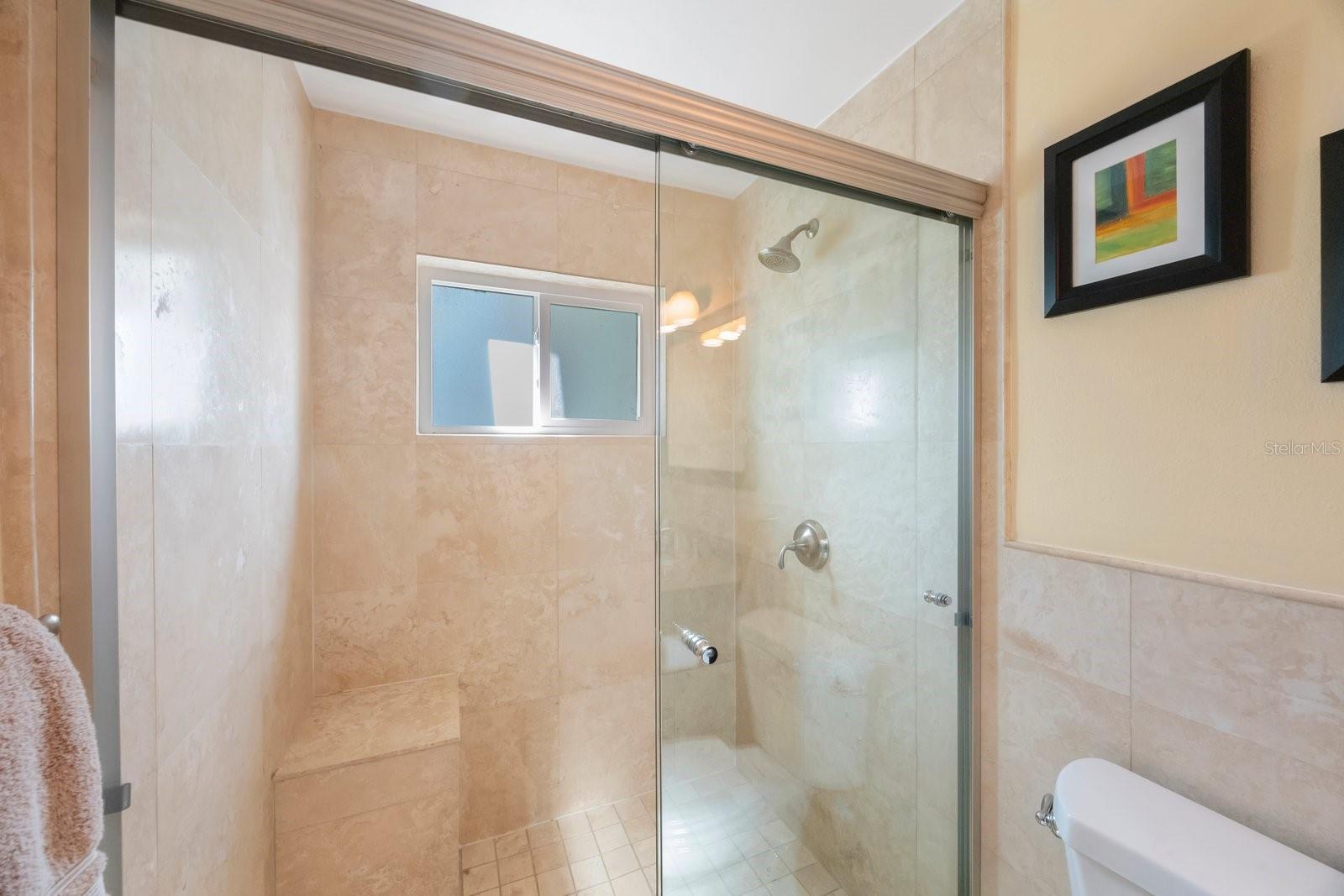 Walk-In Shower W/Travertine Tile Surround