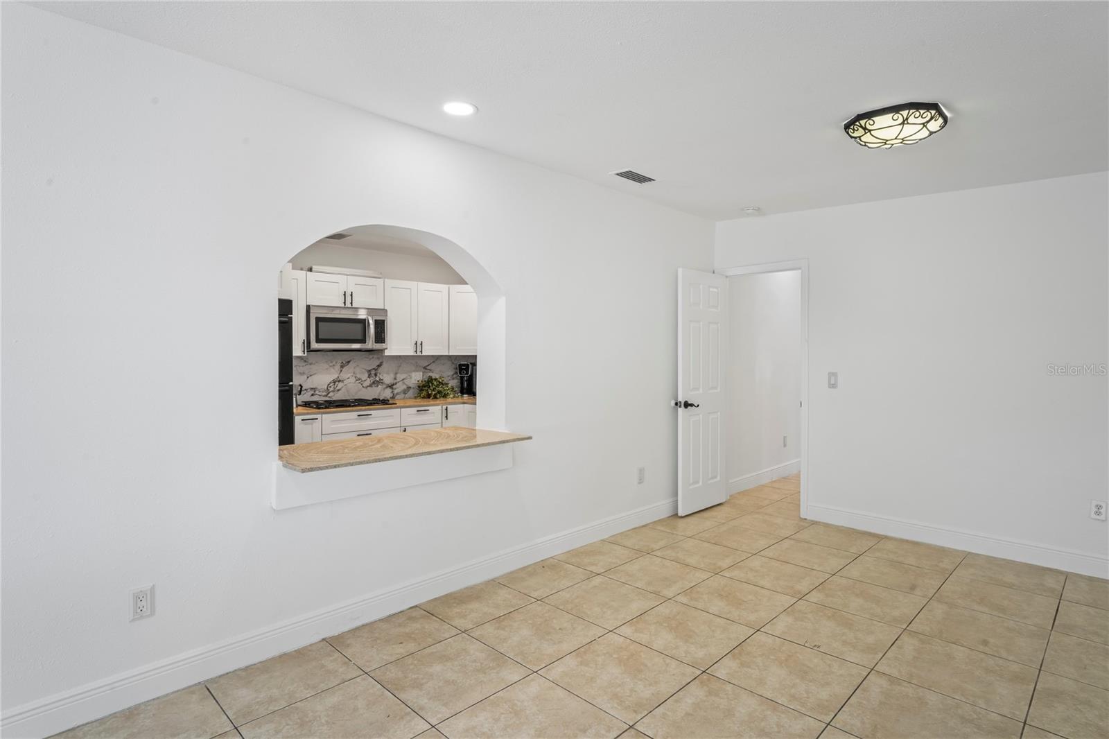 Kitchen pass through to Dining Room