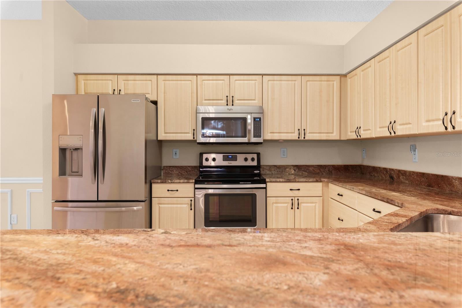 Abundant Counter Space and Cabinets