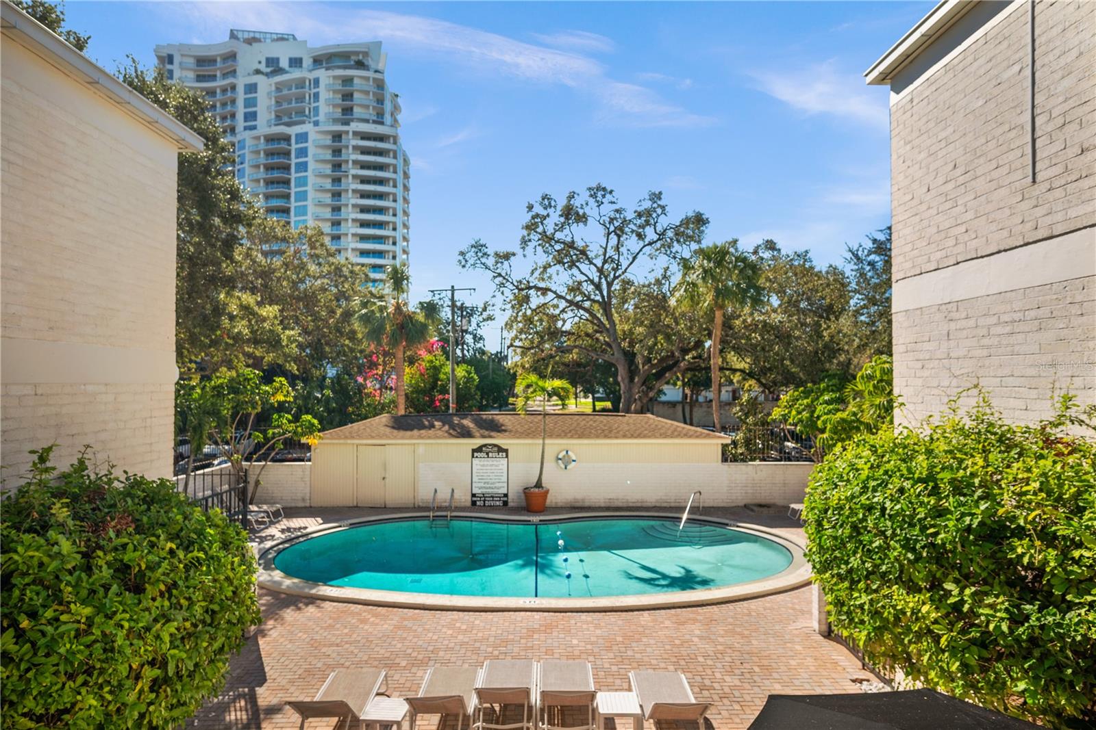 Lovely, peaceful pool area with outdoor shower.