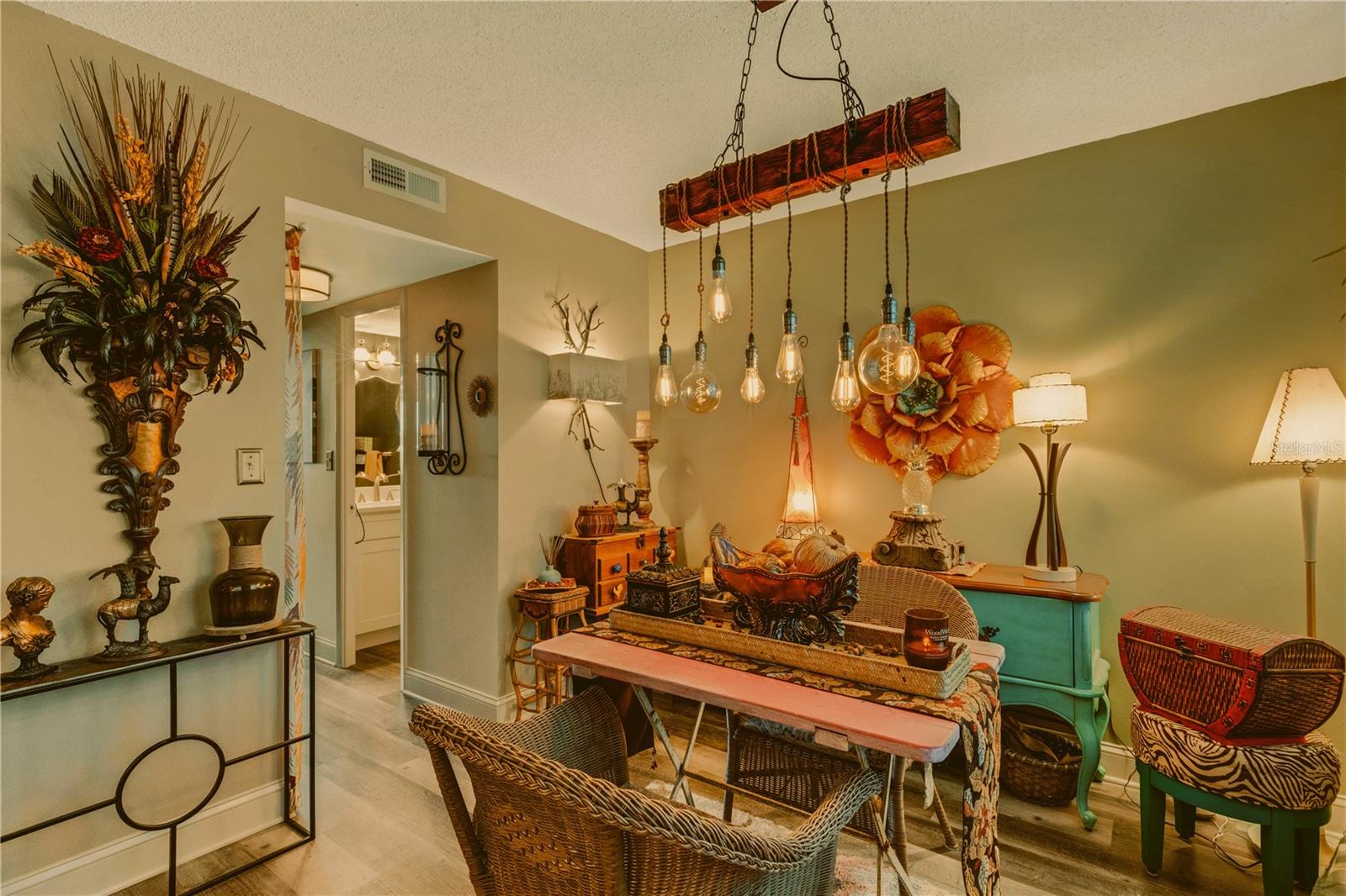 Dining area looking toward half bath!  All furnishings included!