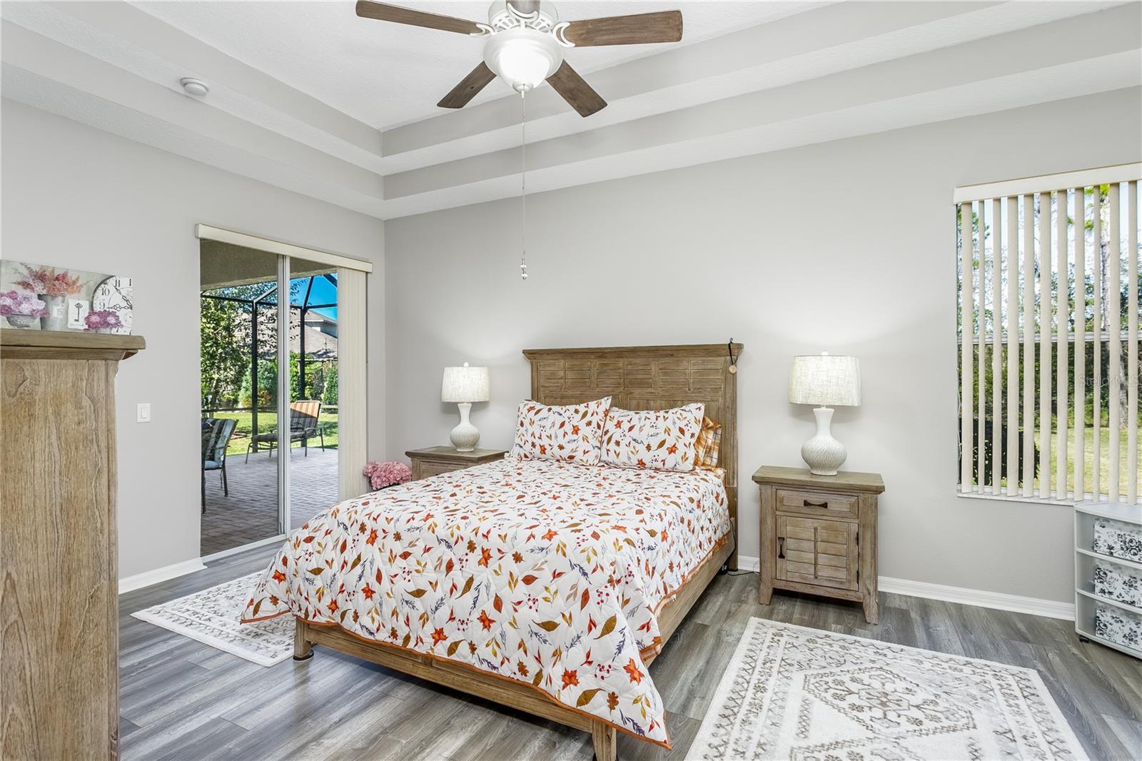 Master bedroom with sliding glass door to the lanai