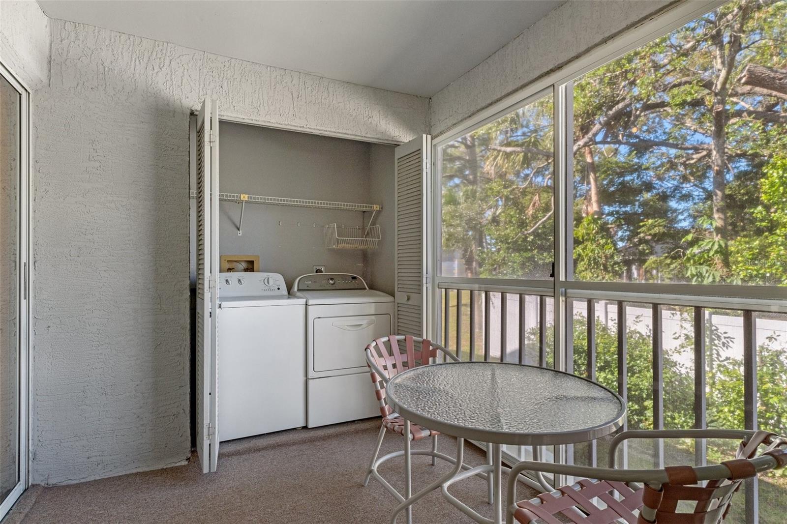 Lanai with Vinyl Windows and Laundry Area