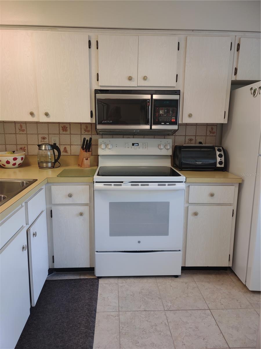 View from hall into kitchen.