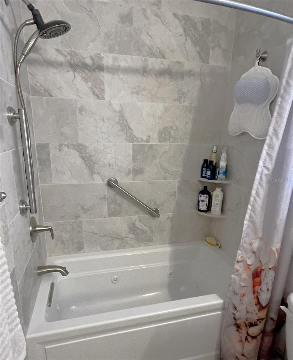 Updated hall bath with jacuzzi tub