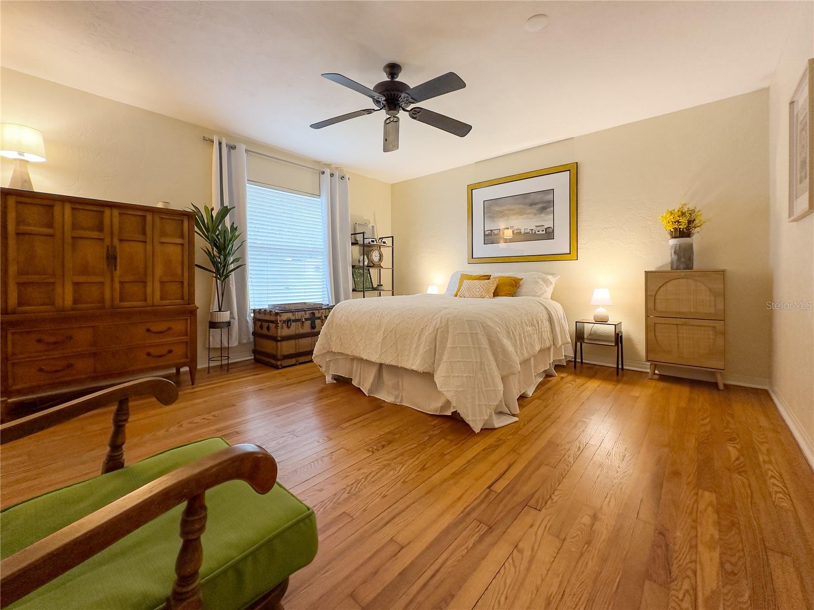 1st Floor Guest Bedroom with original hardwood oak flooring.