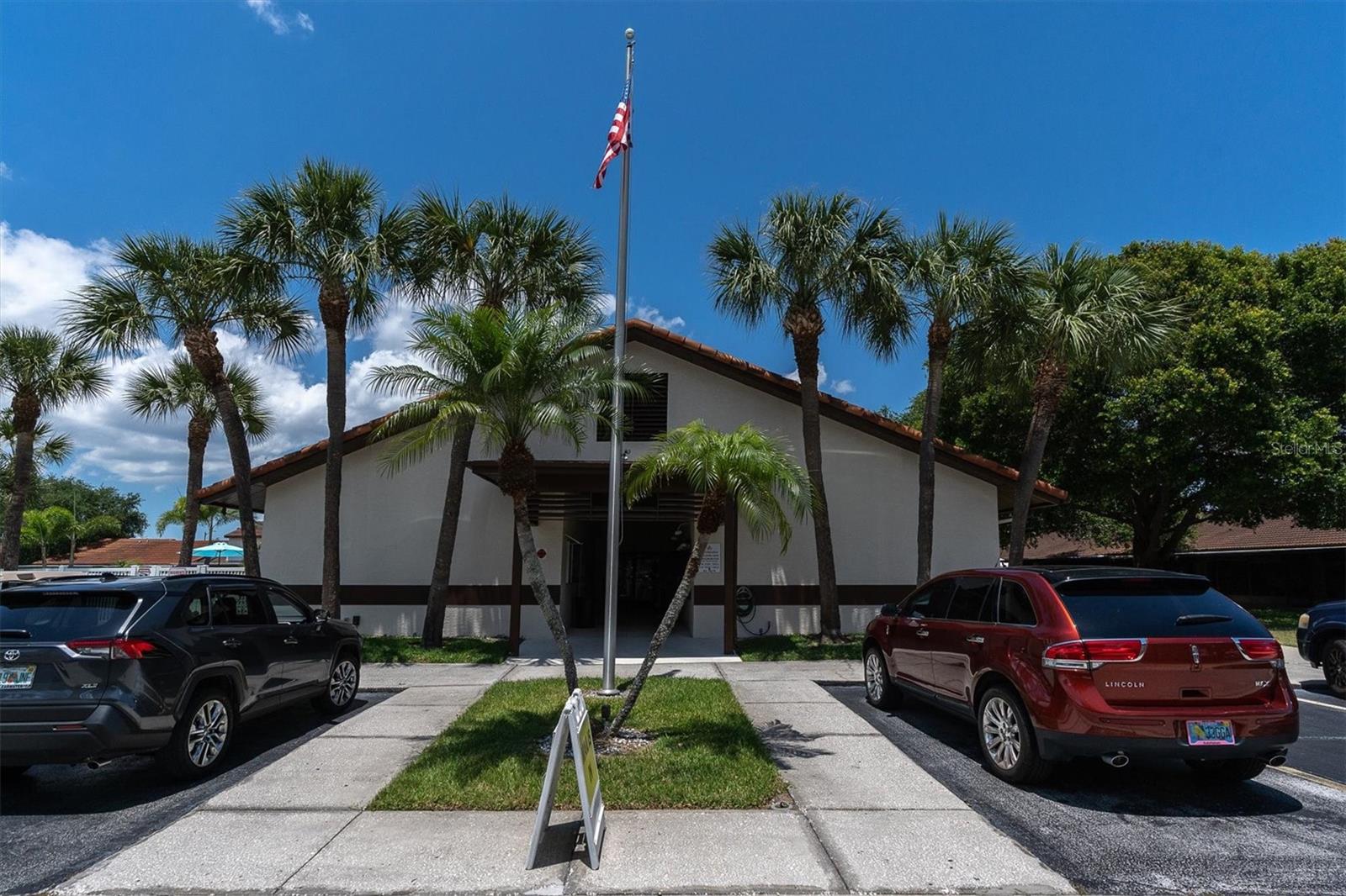 Clubhouse, inside are mailboxes and a party room, and the large pool which is on left side