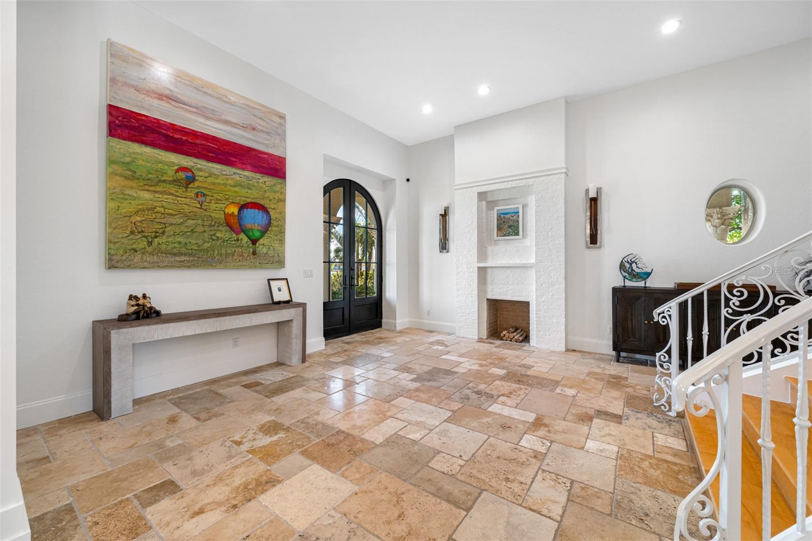 Living Room is large with fireplace and room to entertain