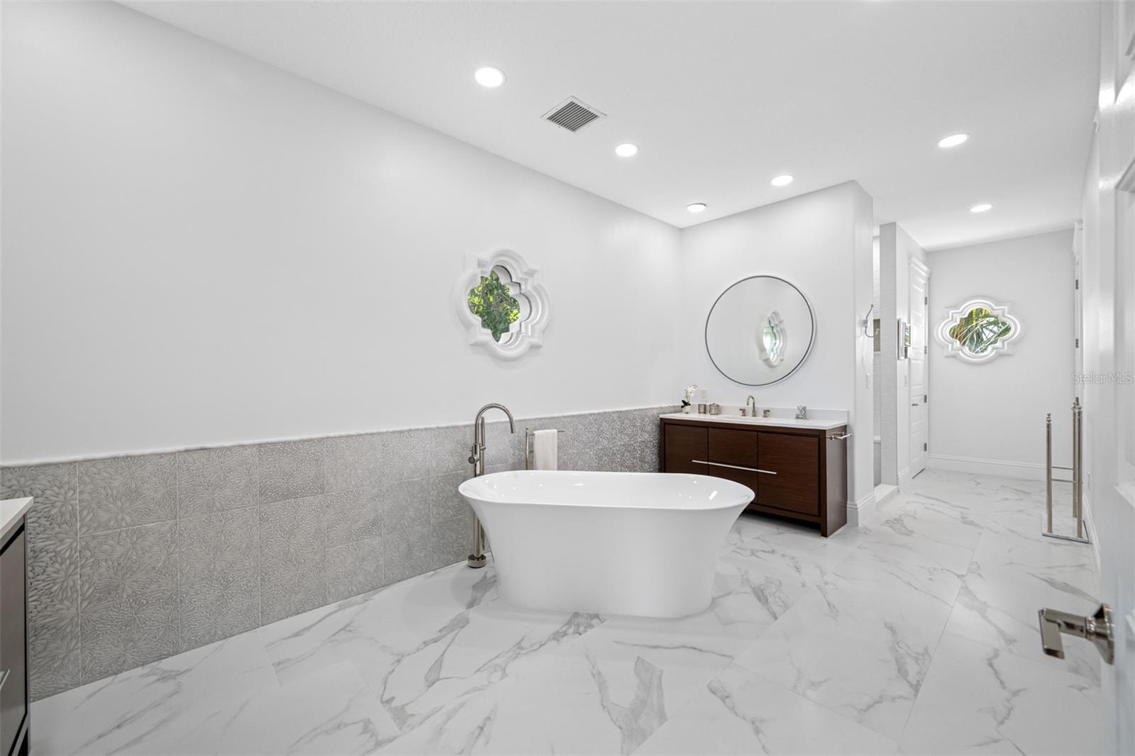 Glamorous architectural windows, soaking tub