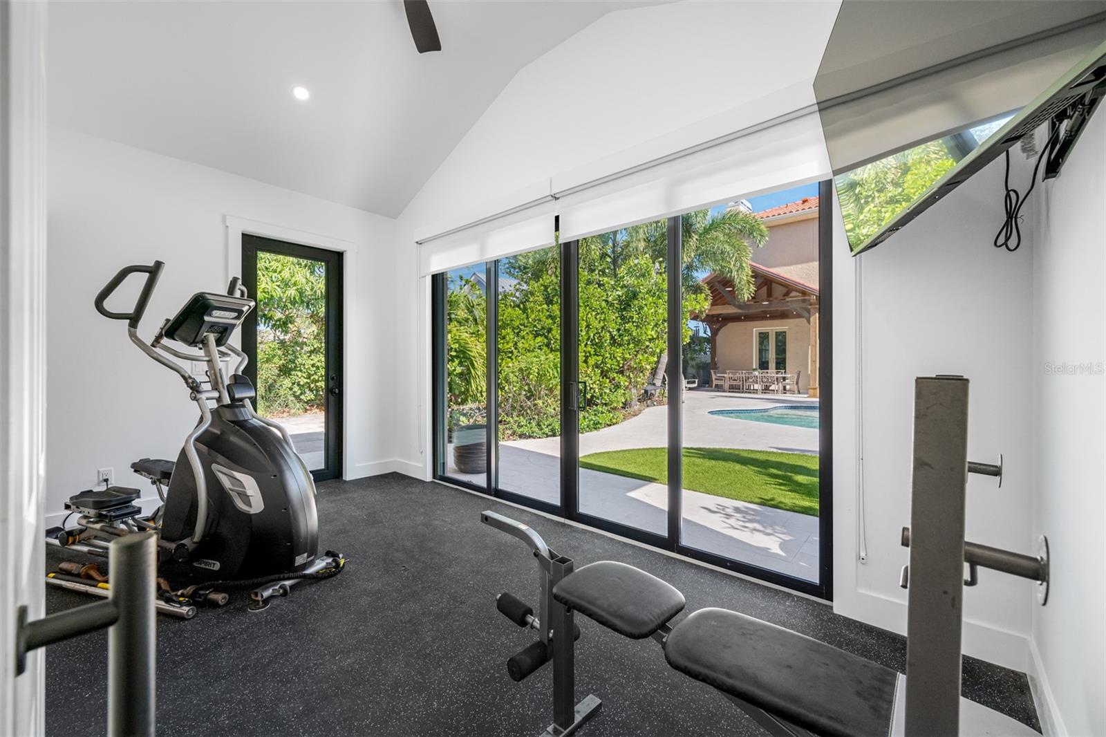 Fitness Room overlooks backyard