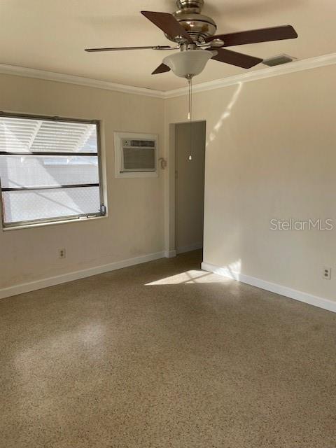 View of living room from front entry, looking toward doorway to kitchen