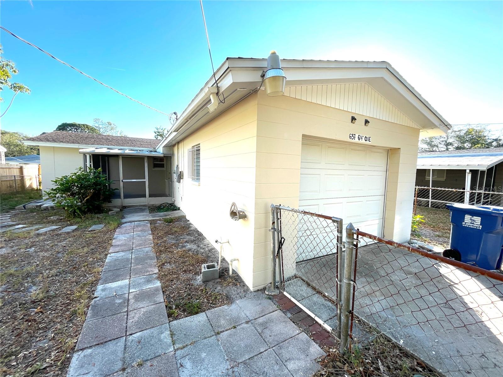 Attached garage with alley access.