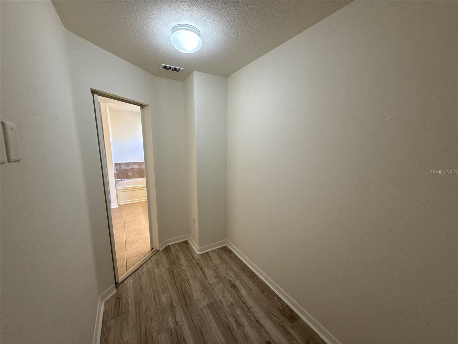 Primary Bedroom Walk-in Closet