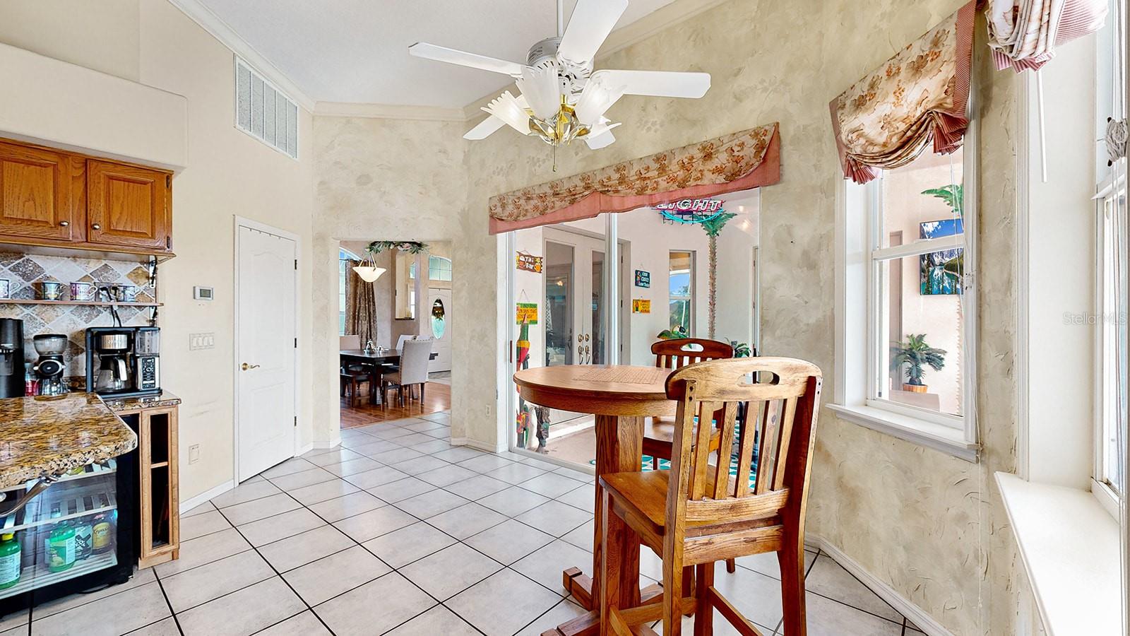 DINETTE AREA - POOL & WATER VIEWS