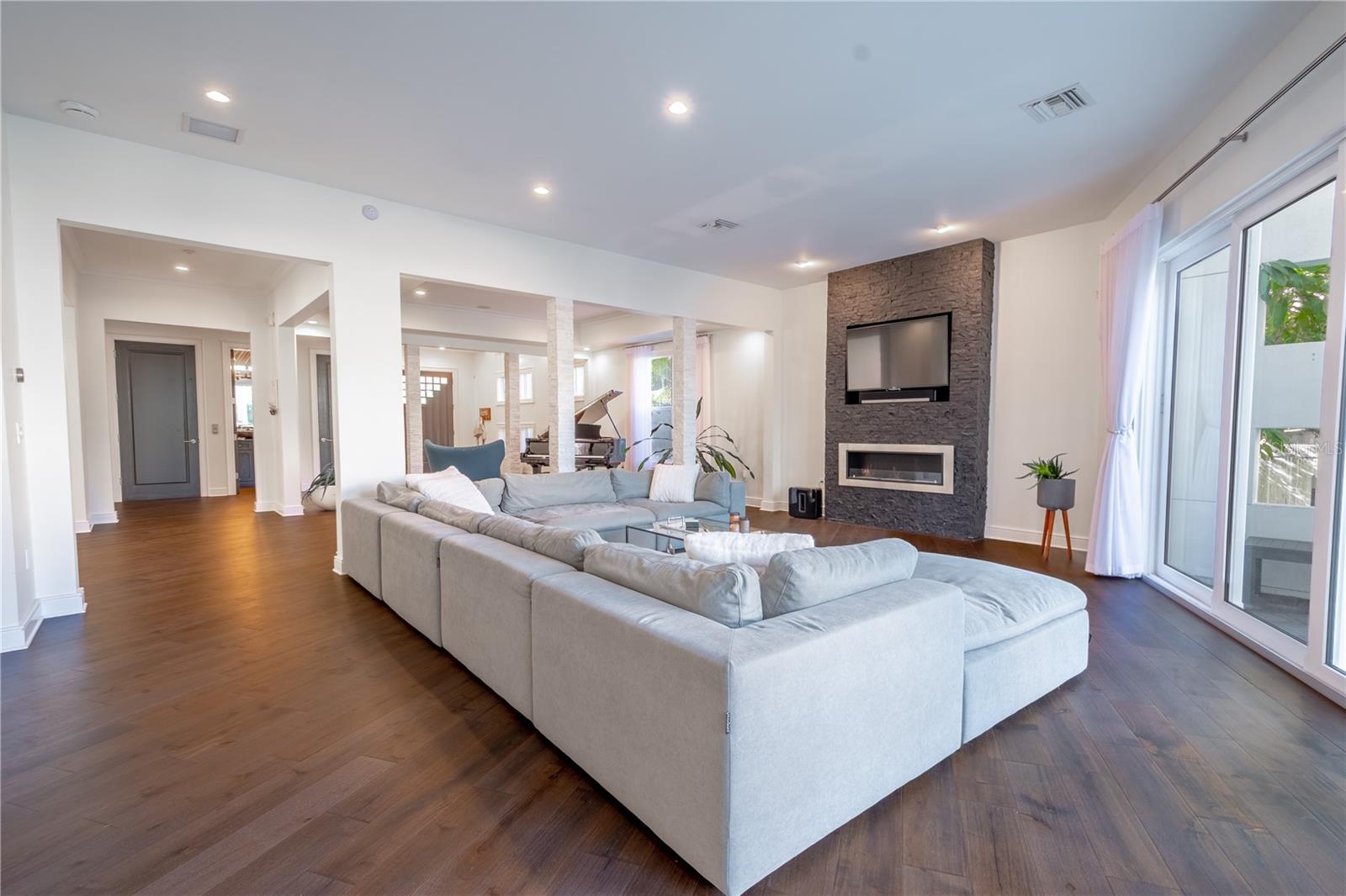 Natural light and contemporary elegance define this family room.