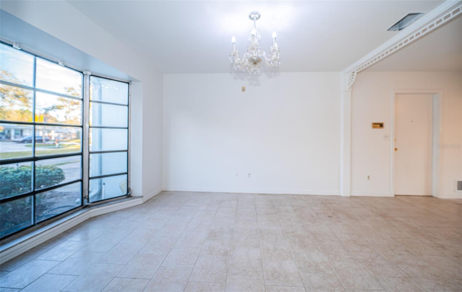 Living Room with Large Bay Window looking out front!