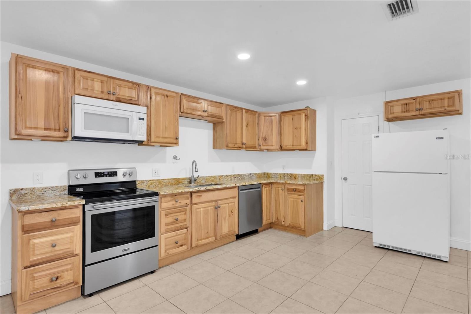 Recently updated kitchen with granite counter tops.