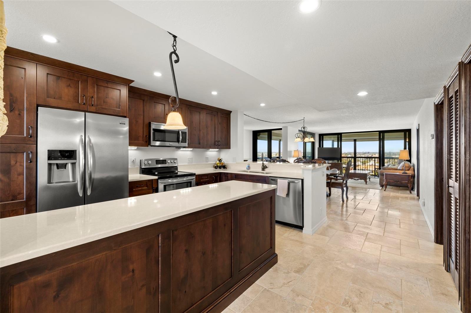 Extensive kitchen island in this classy high quality kitchen